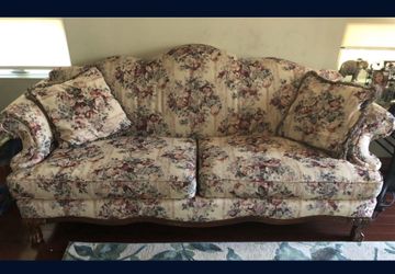 Vintage clawfoot sofa