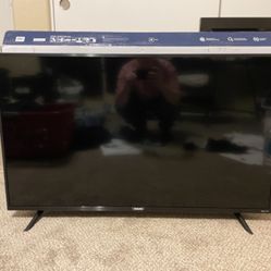 Like New-34" 4k Roku Smart Tv