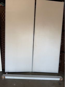 Closert door 79”x60”  riel included