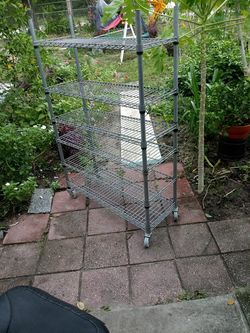7 teir Rack on wheel Adjustable 36"×14 Tall 56"need Adjustment