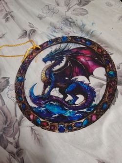 Dragon and Unicorn Pin on Wall