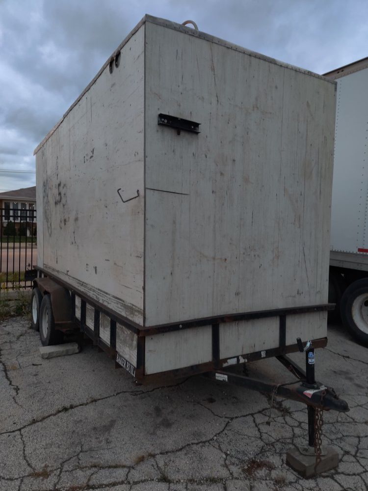 2004 Baker Built 16Ft long trailer. Walls are bolted to side rail
