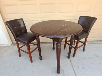 Tall Brown Table and Matching Barstools