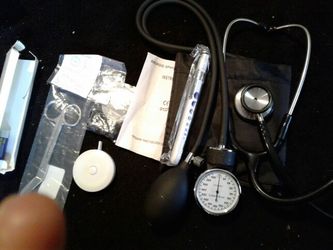 Doctors sphygmomanometer , stethoscope