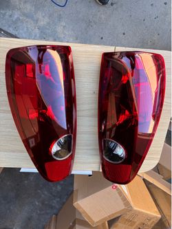 tail light assemblies designed to fit 2004-2012 Chevrolet Colorado and GMC Canyon models.