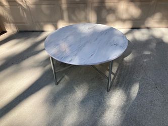 Round faux marble table