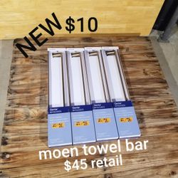 new moen 24 inch towel bar in bronzed gold finish $45+tax retail each 