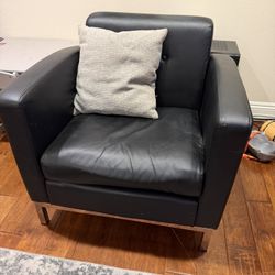 2 Faux Leather Chairs