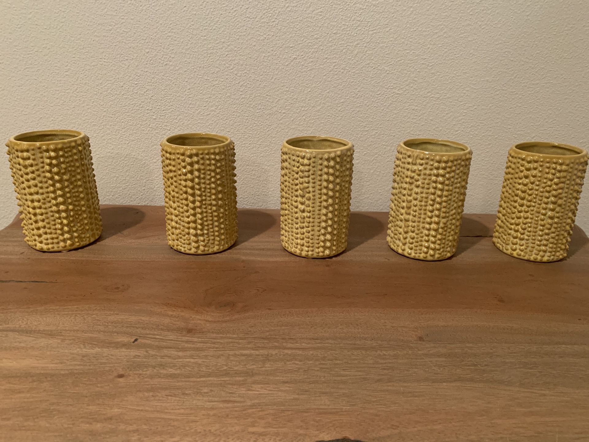5 Yellow vases