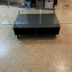 Glass Tv stand with wheels