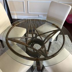 Round 42” Glass Top table With chairs and Rug