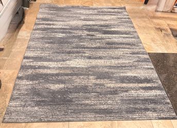 Like New Area Rug  ( 9’11” x 7’ )