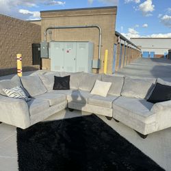 Light gray L-shaped sectional sofa