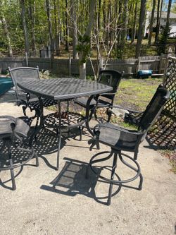 Patio high top table with 4 chairs