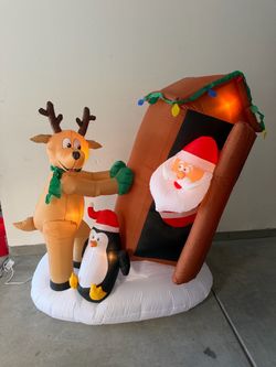 Christmas Airblown Inflatable Santa with Reindeer and Penguin Tipping Outhouse 6.5ft Animated (New)