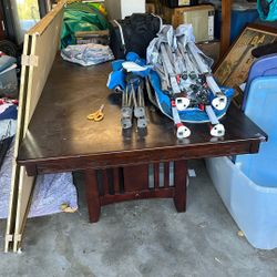 Free dining room table with expander. No chairs.