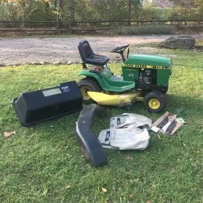 John Deere 112L Hydrotatic Riding Lawn Tractor With Bagger & Blades