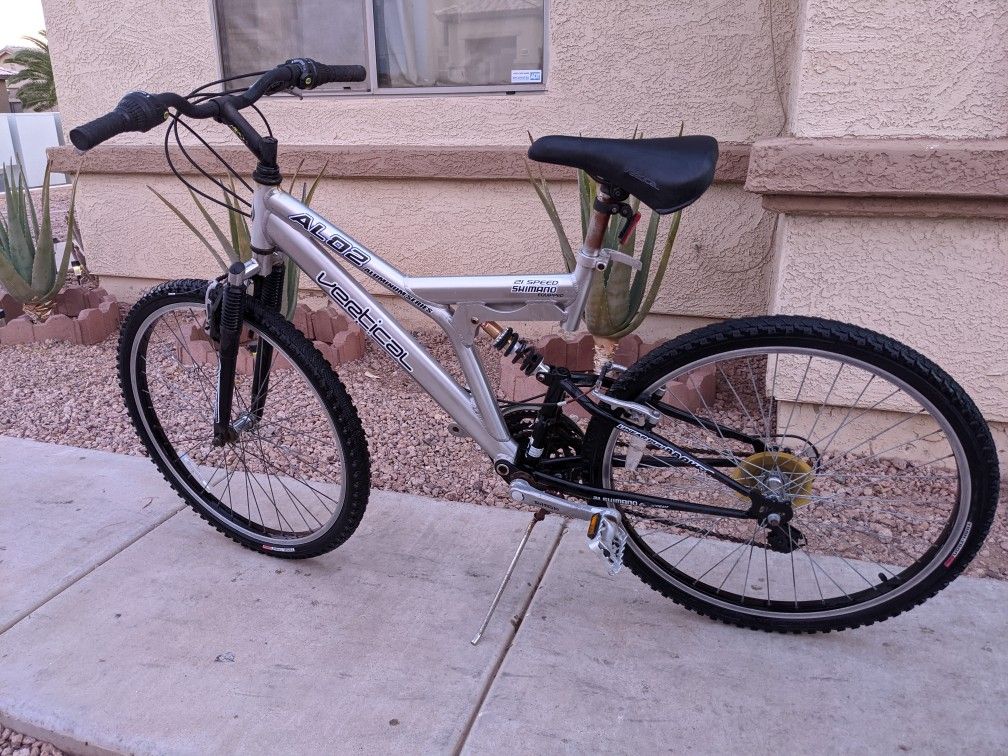 Vertical mountain bikes prices hot sale