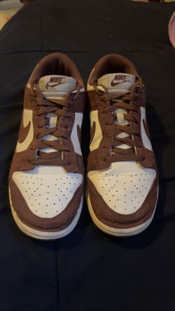 Brown and white Nike dunks—size 9.5