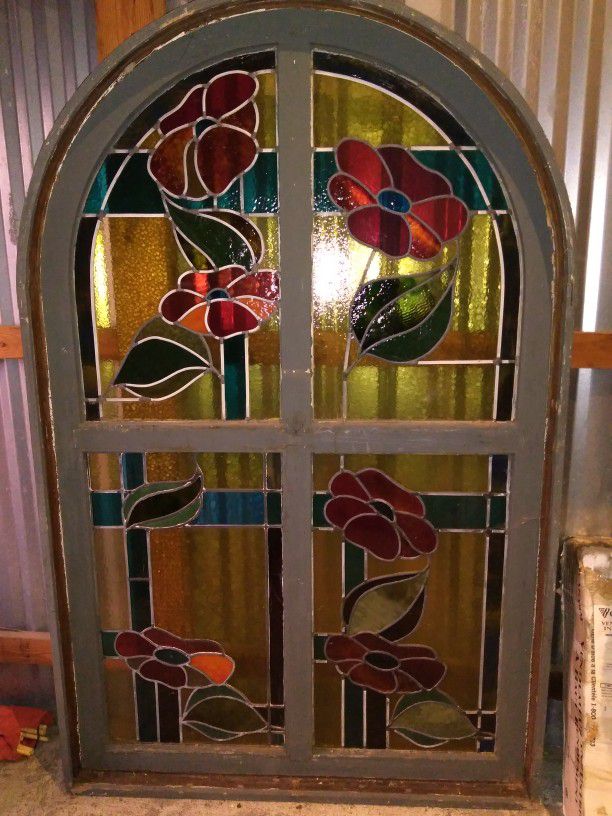 Antique leaded stained glass window five feet tall rounded