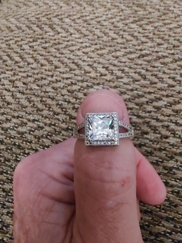 STERLING SILVER, CZ RING.  SIZE 9.5 NEW. PICKUP ONLY