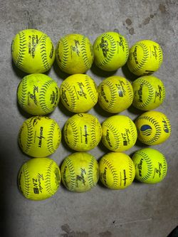 $55 - lot of 15 used softballs