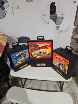 3 - Hot Wheels 100 Car Carrying Case $65 no cars included