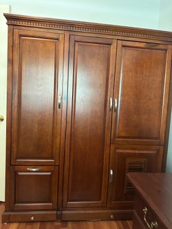 Armoire, holds lot in relatively small space