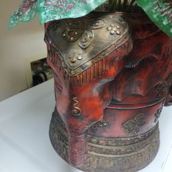 Silk Flowers In Elephant Wooden Basket