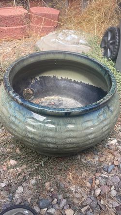 Glazed ceramic clay garden hose pot