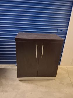 Dark Brown Two-Door Storage Cabinet $60 each