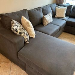Large And Beautiful Dark Grey Sectional Couch From Living Spaces 