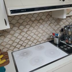 Electric Cooktop And Over The Range Fan.