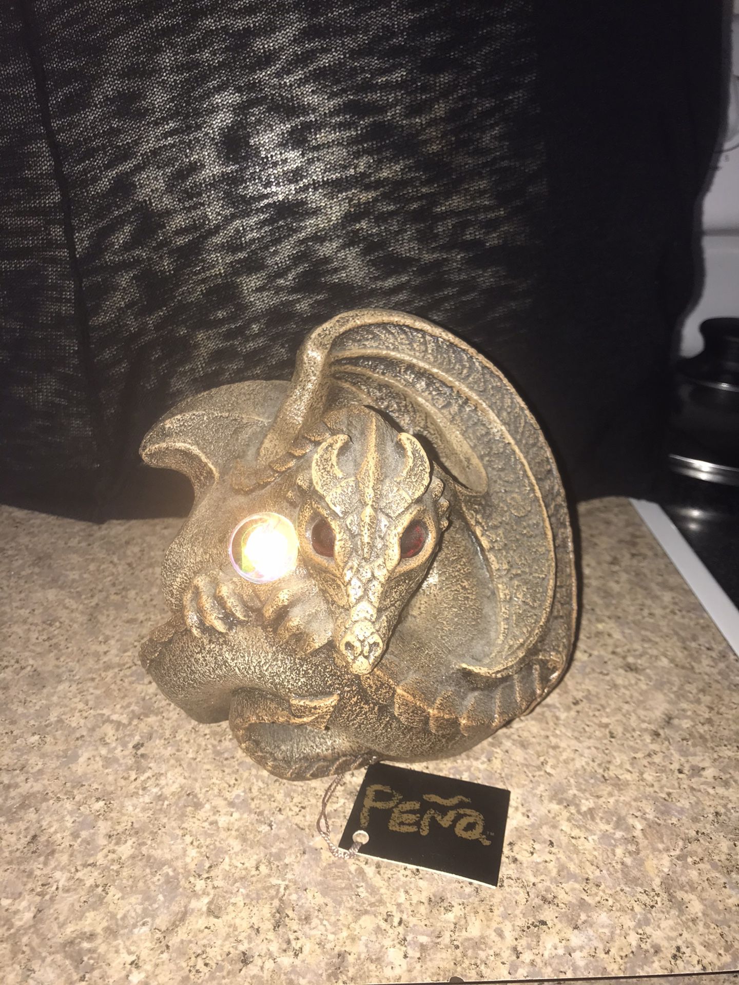 Windstone dragon candle holder