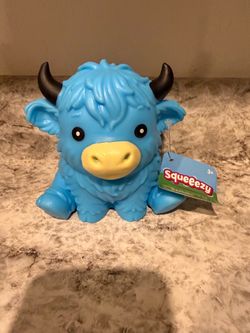 Squeeezy highland cows