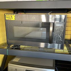 New GE Over The Range Microwave