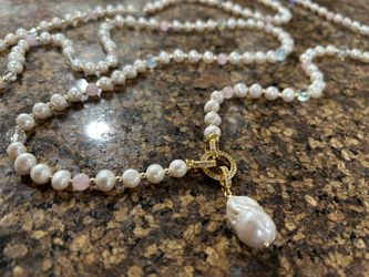 Handmade necklace crafted with genuine freshwater pearls, soft pink stone accents, and delicate crystal details