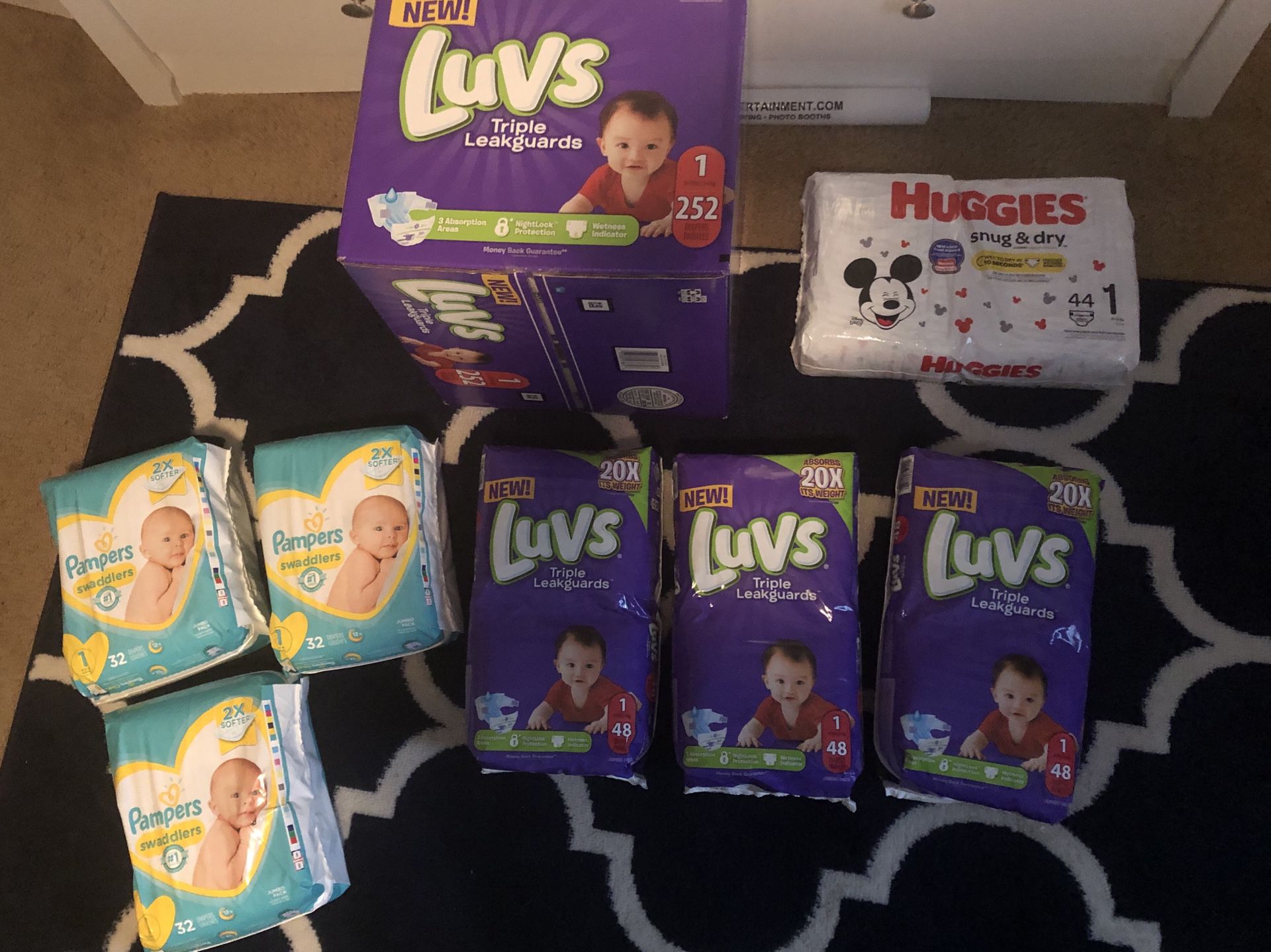 Size 1 diapers-huggies, LUVS, Pampers