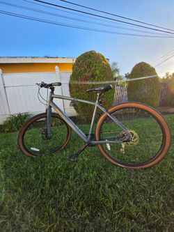 Gray Urban Bike with Tan Wall Tires