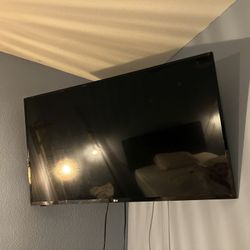 42” Tv And Wall Mount 