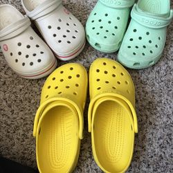 3 Pairs Of Crocs 