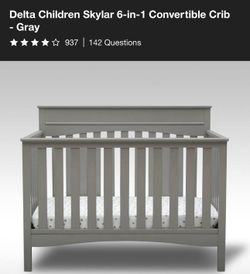 white baby crib 