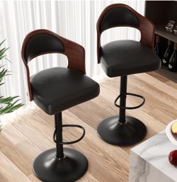 Wooden stools with leather upholstery