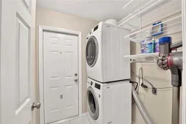 Stacking LG Front Load Washer + Kenmore Electric Dryer