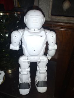 White Humanoid Robot Toy Figure