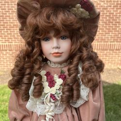 Vintage Auburn 24" Porcelain American Classic Cracker Barrel Dorthy Ann Doll   Measurements are approximate. A rosette is on one shoe only.   Non-smok