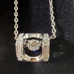 Rocking Heart With Dancing Moissanite Sterling Silver Necklace 