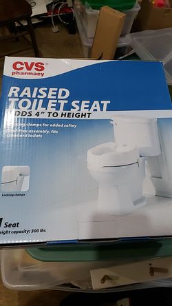 Raised toilet seat