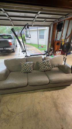 Grey Upholstered Three-Cushion Sofa with Accent Pillows