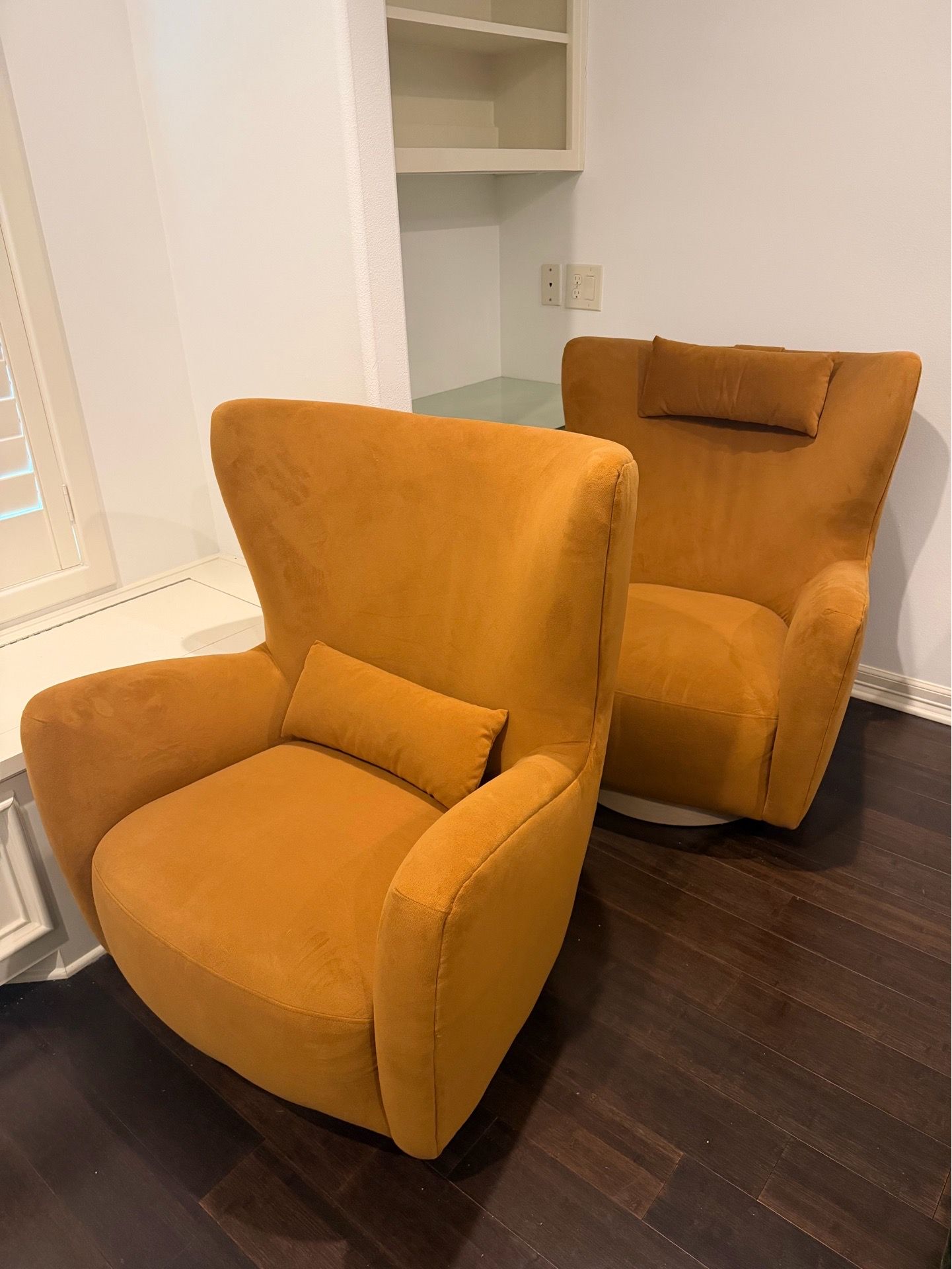 Castlery swivel armchairs